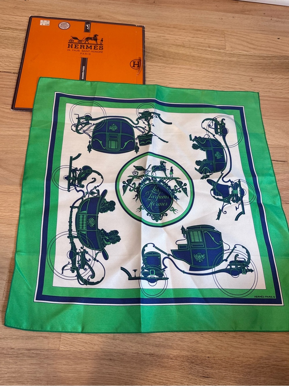 Designer scarf purchased at Bergdorf Goodman Silk Scarf in green in sleeve